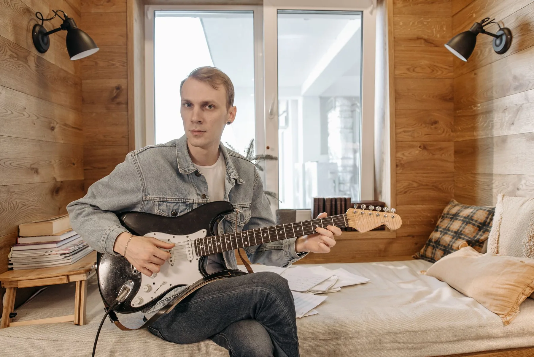 Musician playing an electric guitar Musician playing an electric guitar