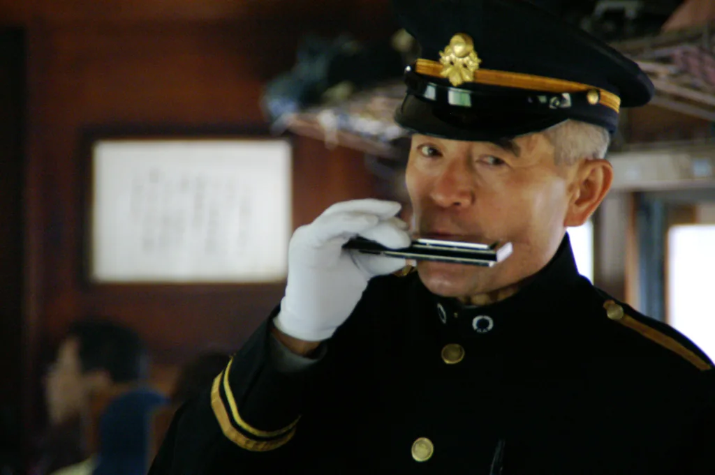 Blues harmonica player in uniform Blues harmonica player in uniform