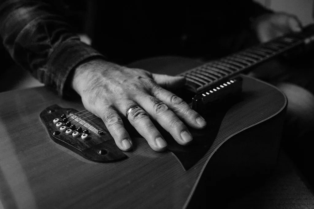 Musician playing a blues guitar Musician playing a blues guitar