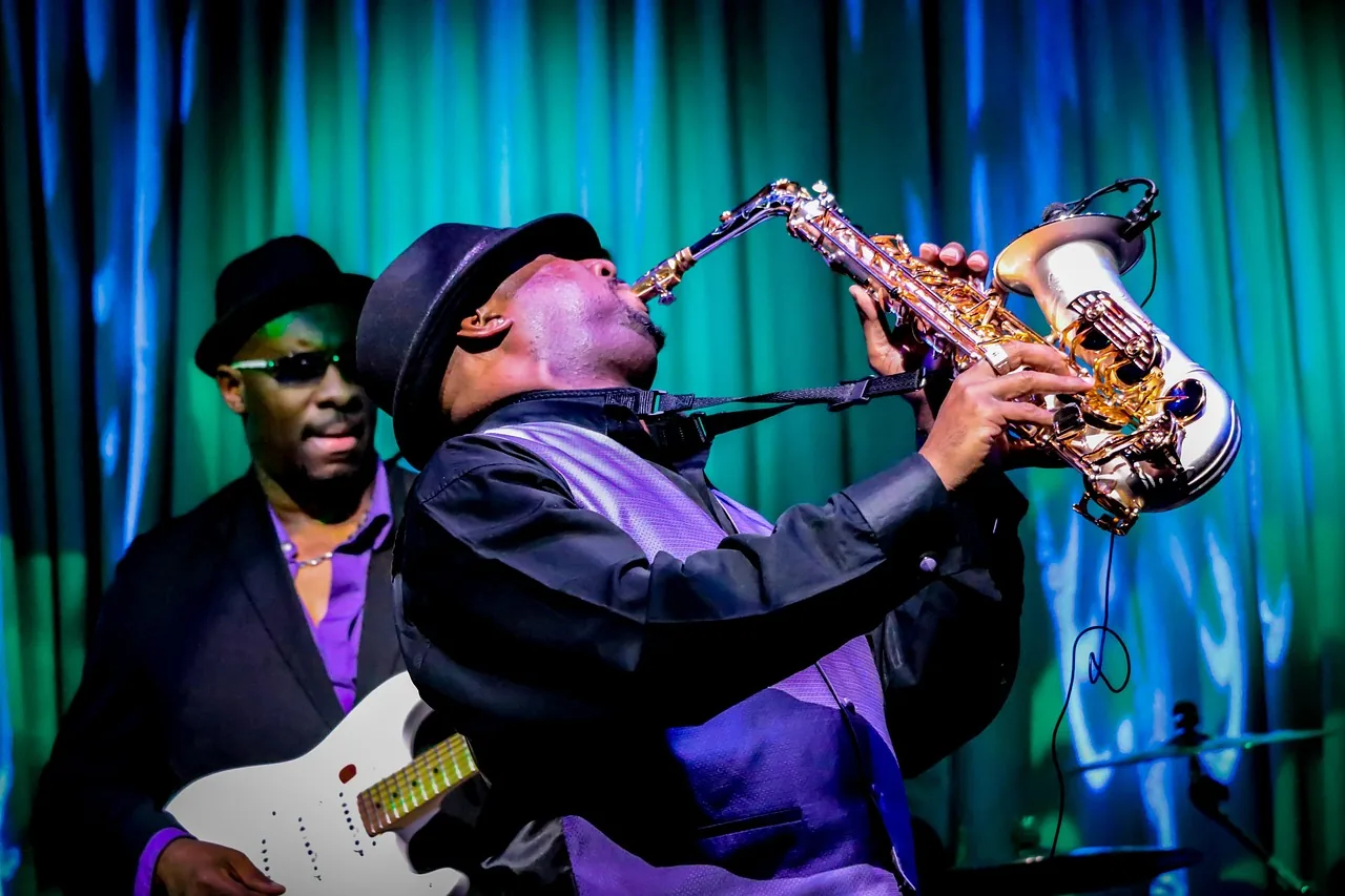 Modern blues saxophonist on stage Modern blues saxophonist on stage