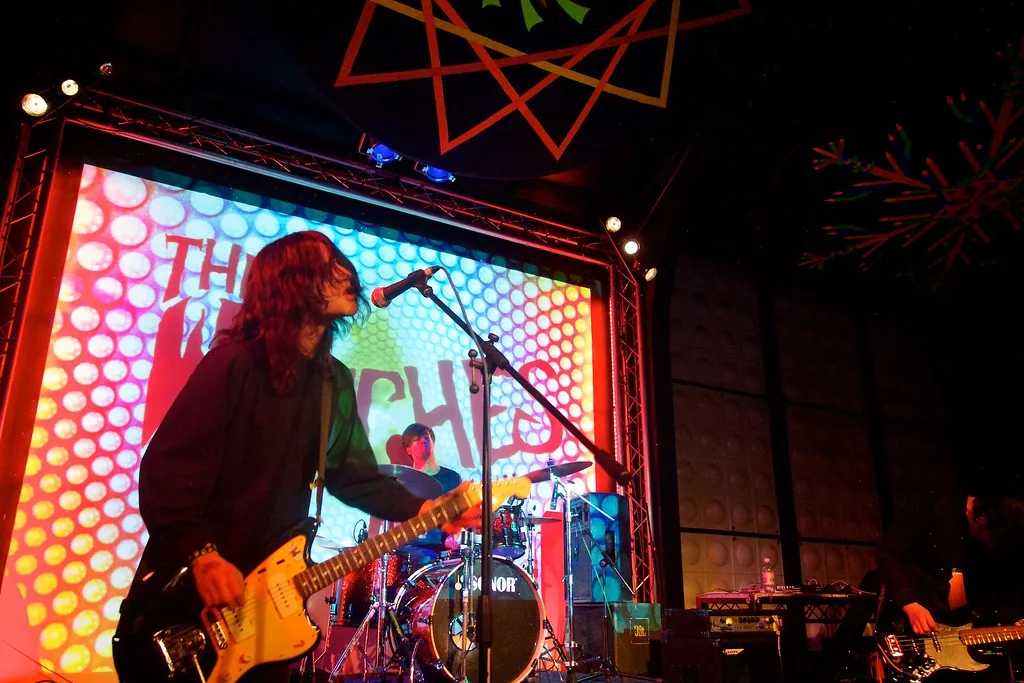 Band performing in a club Band performing in a club