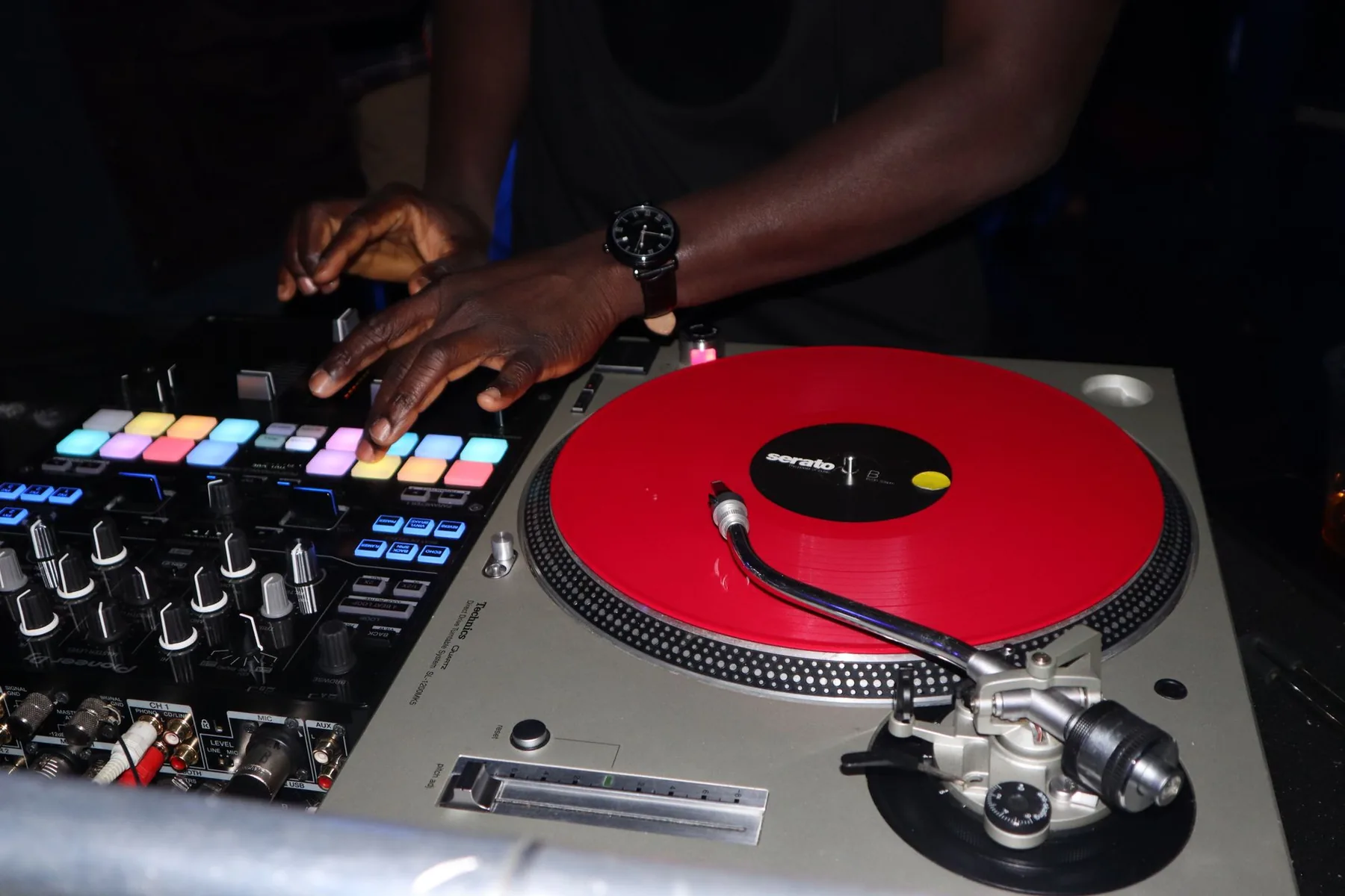 Hip-hop DJ at vinyl turntables Hip-hop DJ at vinyl turntables