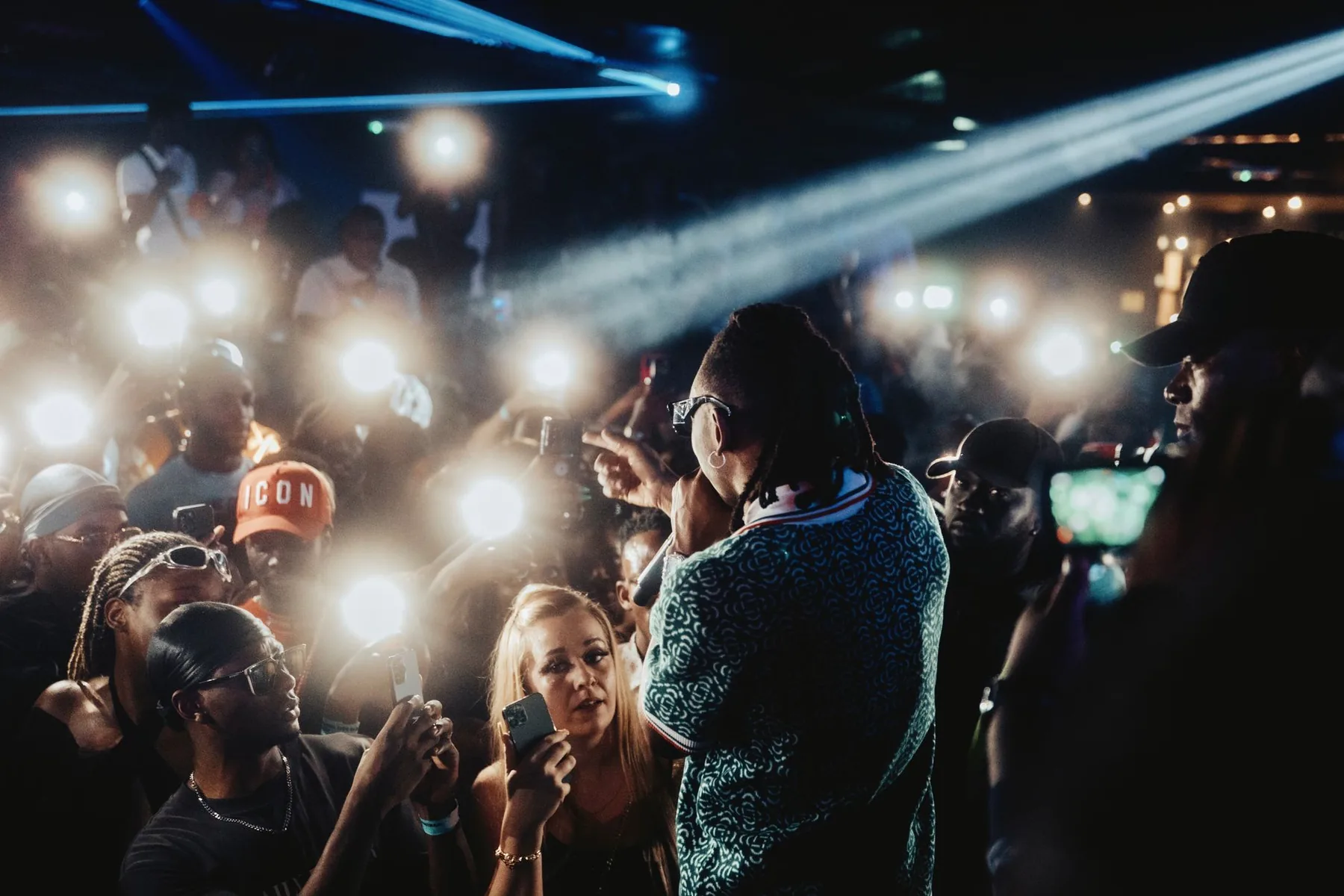 Hip-hop rapper performing at an urban concert Hip-hop rapper performing at an urban concert