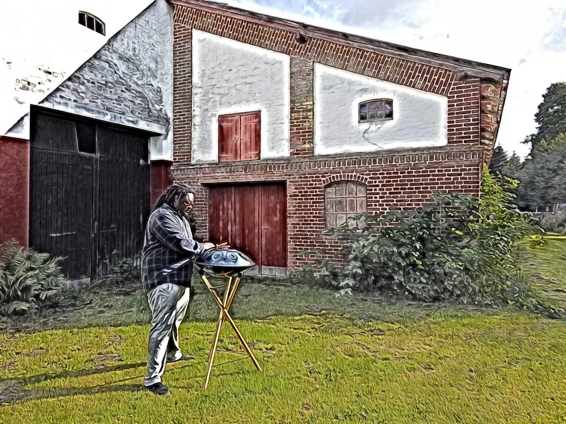 Musician playing a handpan outdoors Musician playing a handpan outdoors