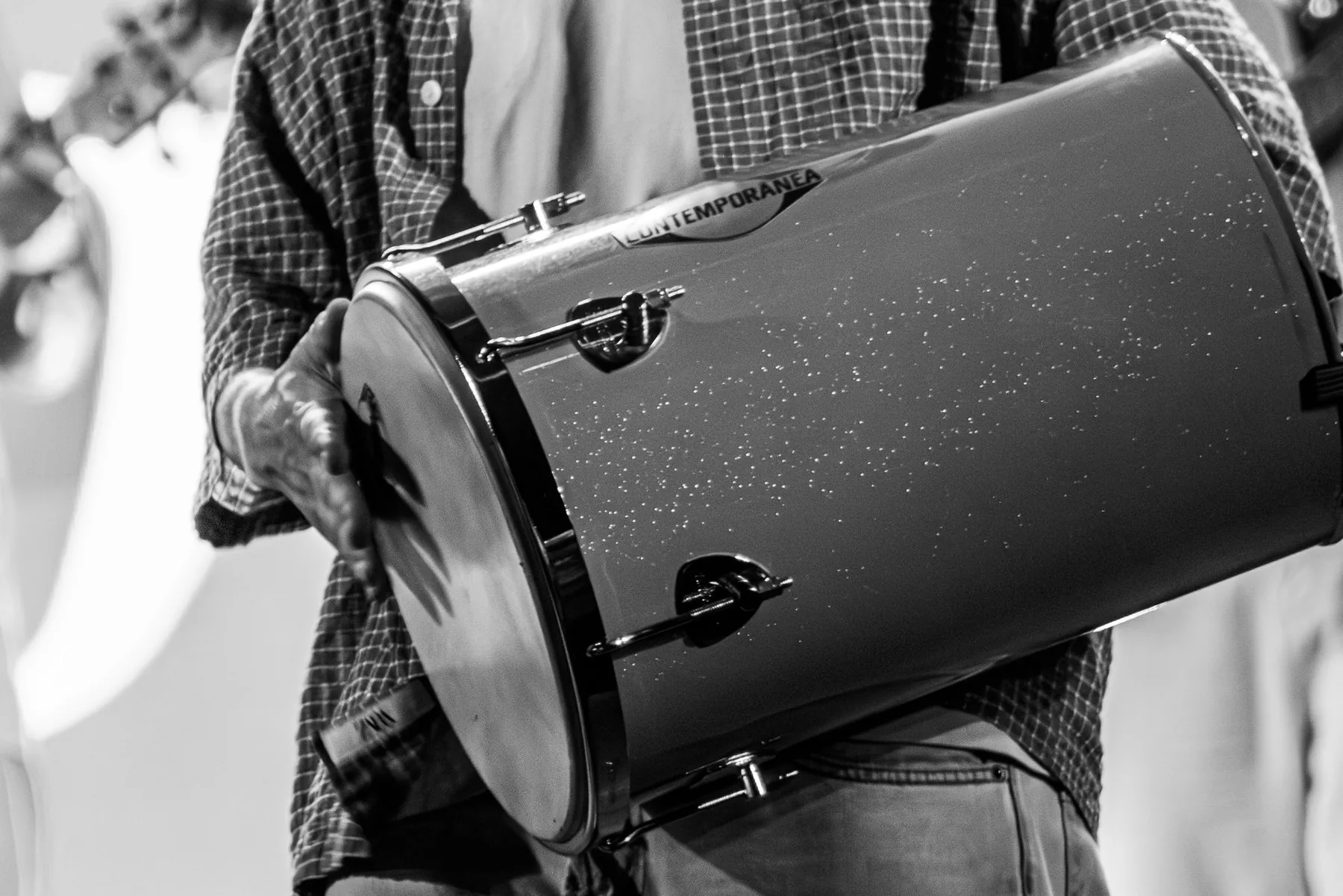 Musician playing a large drum Musician playing a large drum